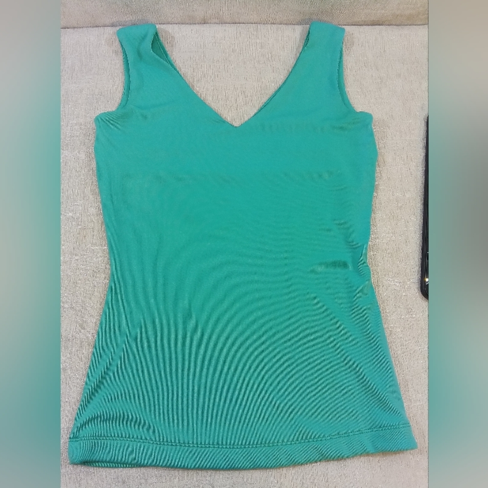 Turquoise XS CACHE blouse.